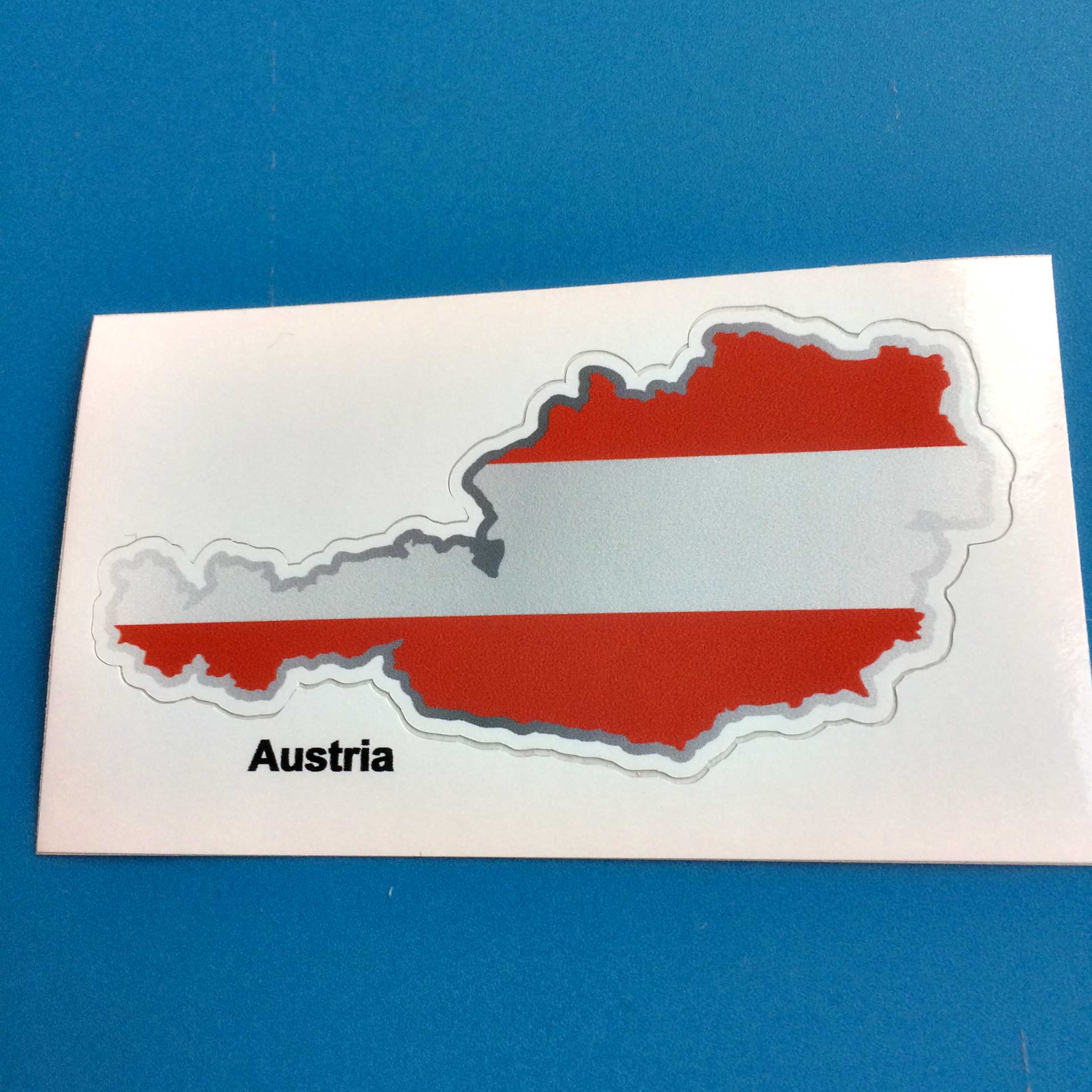 AUSTRIA FLAG AND MAP STICKER. Red and white Austria flag and map.