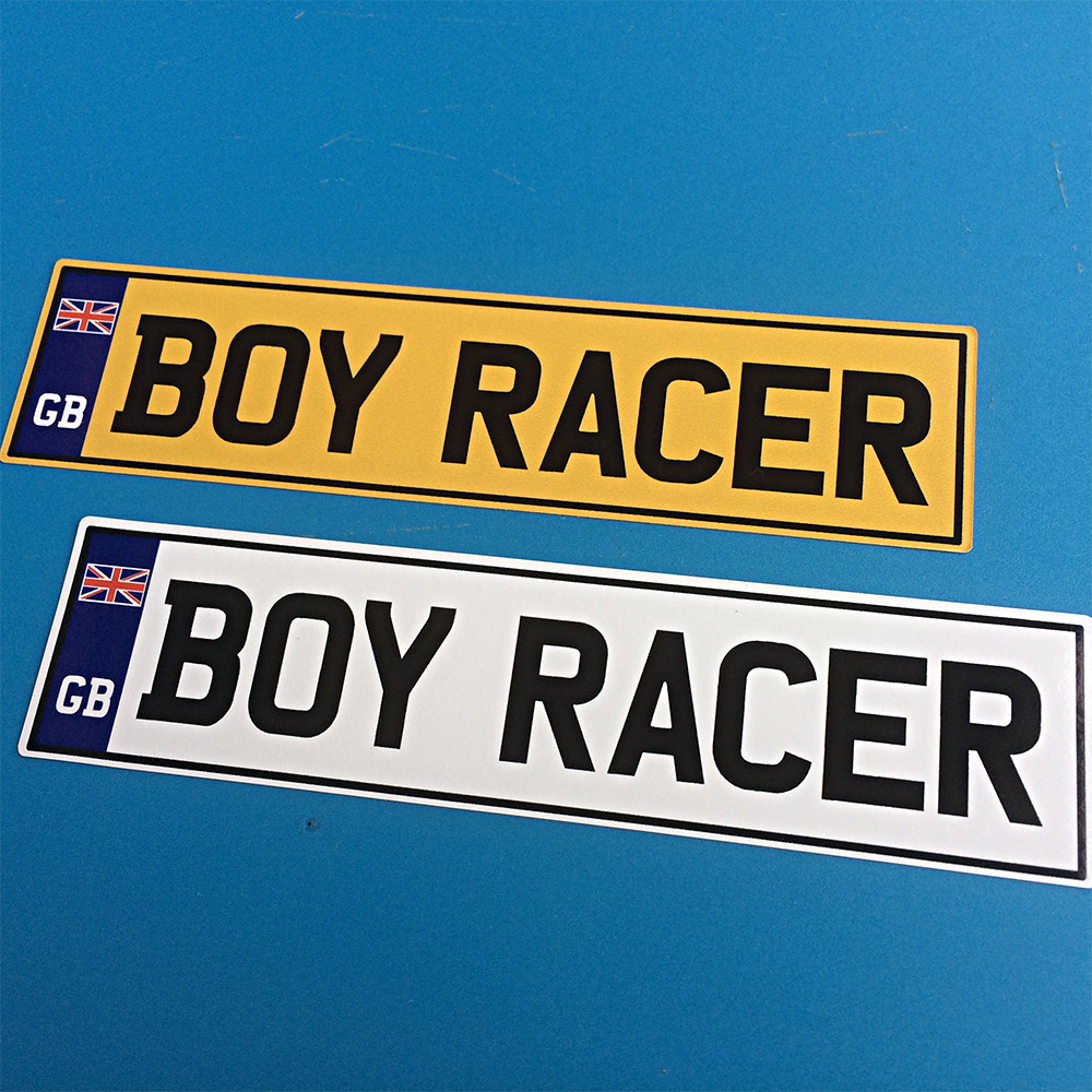 'BOY RACER' NUMBER PLATE STICKERS. Boy Racer in black capitals. Left side is a Union Jack. GB in white. Both sit on a blue column.