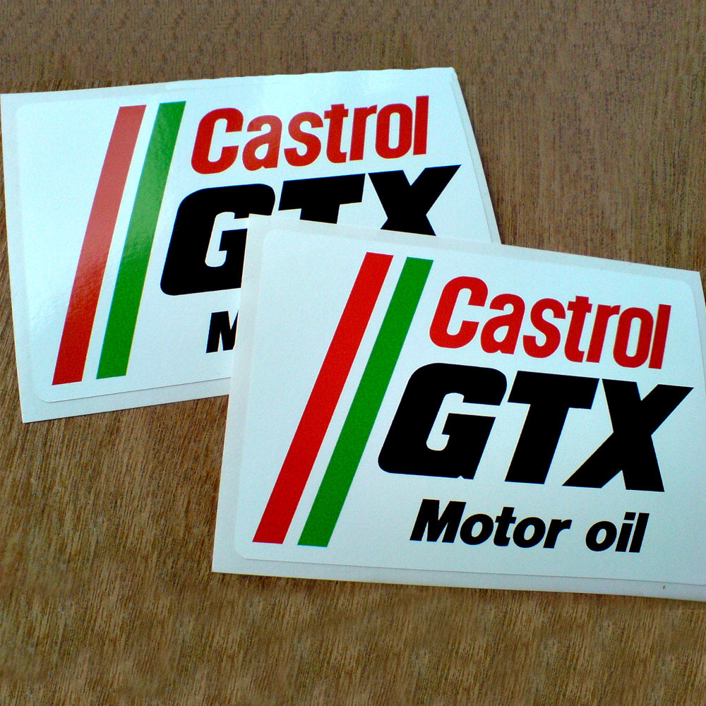 Castrol in red lowercase, GTX in bold black, Motor oil in black lowercase lettering on a white sticker. Two diagonal lines in red and green run down the left side of the sticker.
