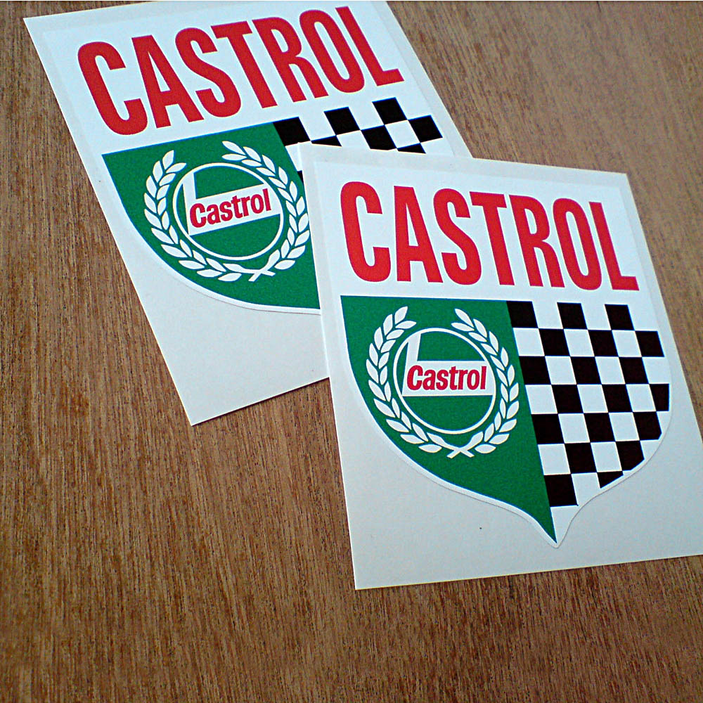 Castrol in red uppercase lettering on a white banner across the top of the shield. The Castrol logo surrounded by a white garland on a green background is displayed on one half of the shield and black and white chequer on the other half.
