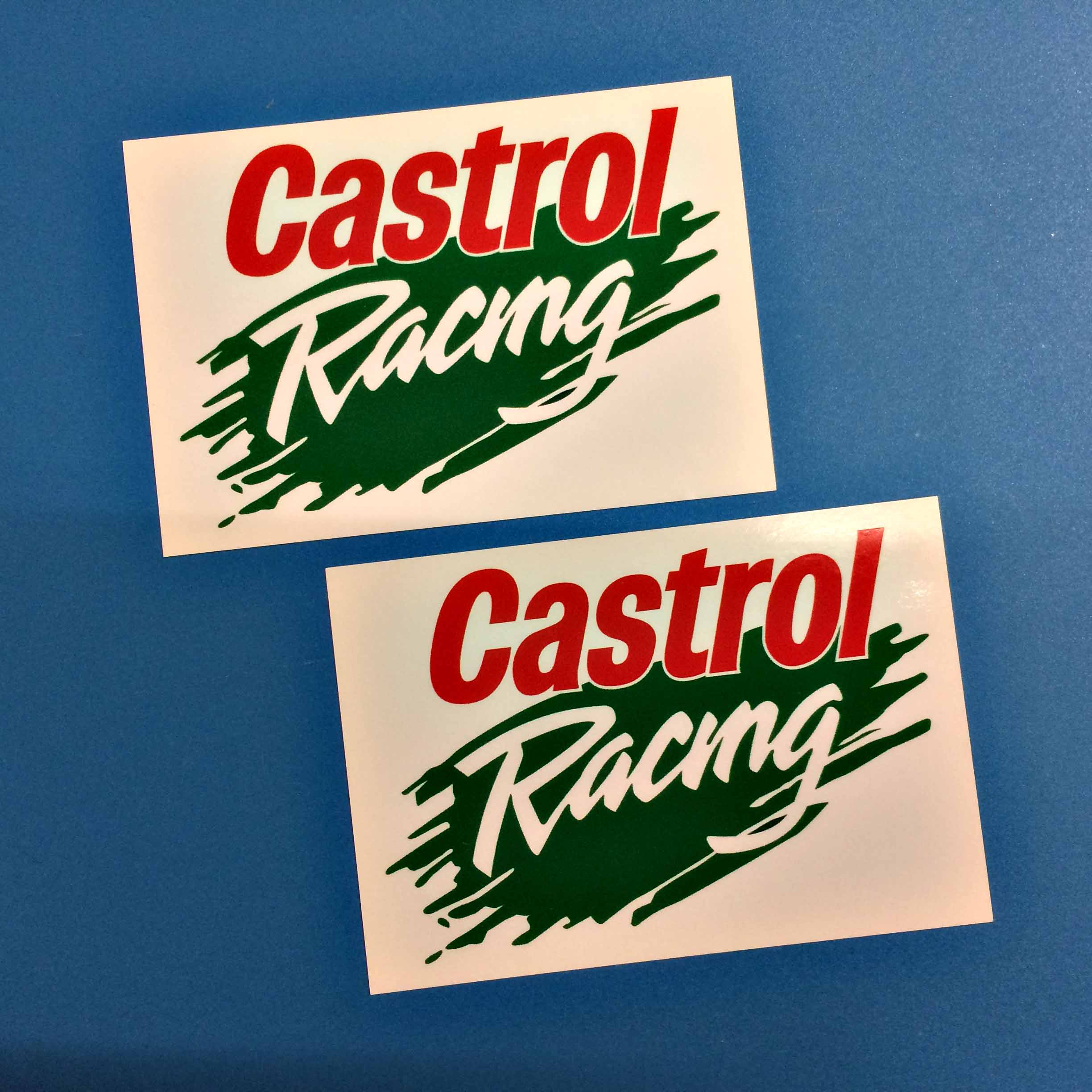 CASTROL RACING OIL STICKERS. A white sticker with a green brush stroke in the centre. Castrol in red and Racing in white lettering overlays this.
