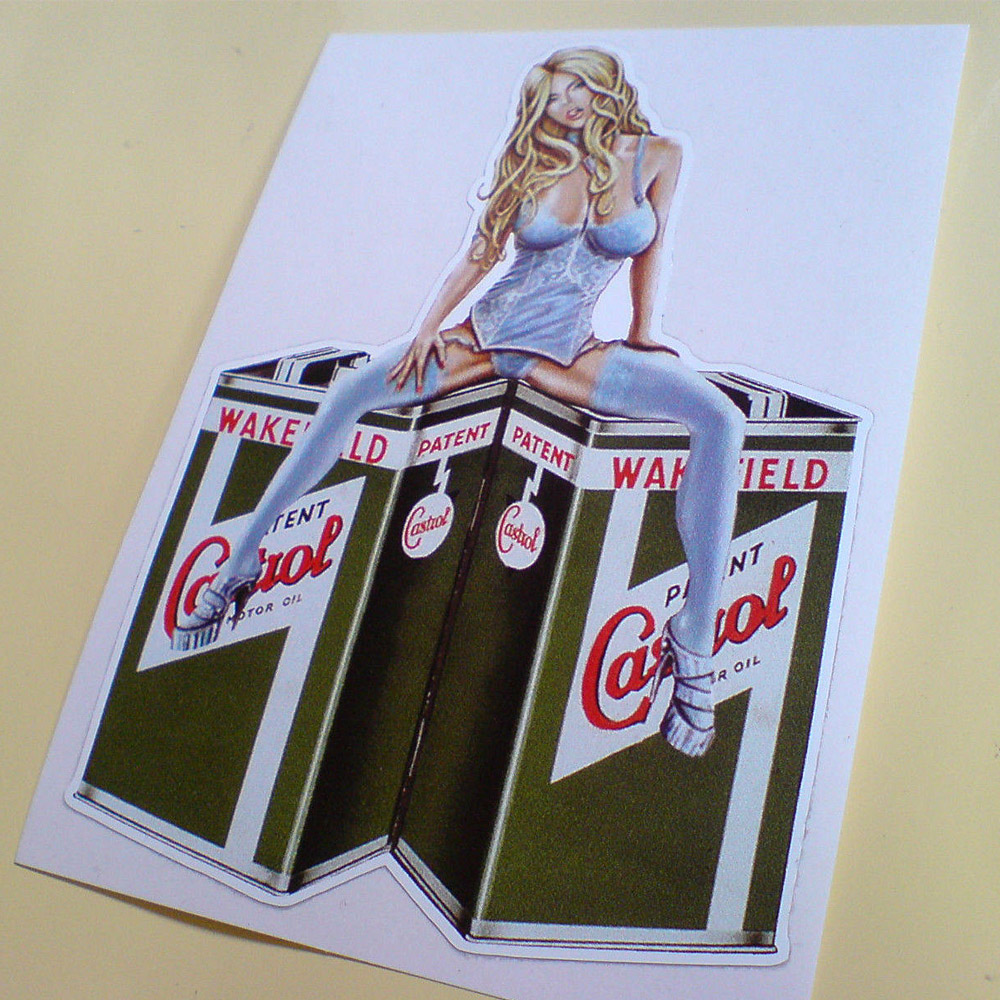 CASTROL WAKEFIELD OIL CAN MODEL STICKER. A long blonde haired model wearing pale blue basque, knickers, stockings and heels sits astride two green classic Castrol Oil tins with the red and white logo on the side.