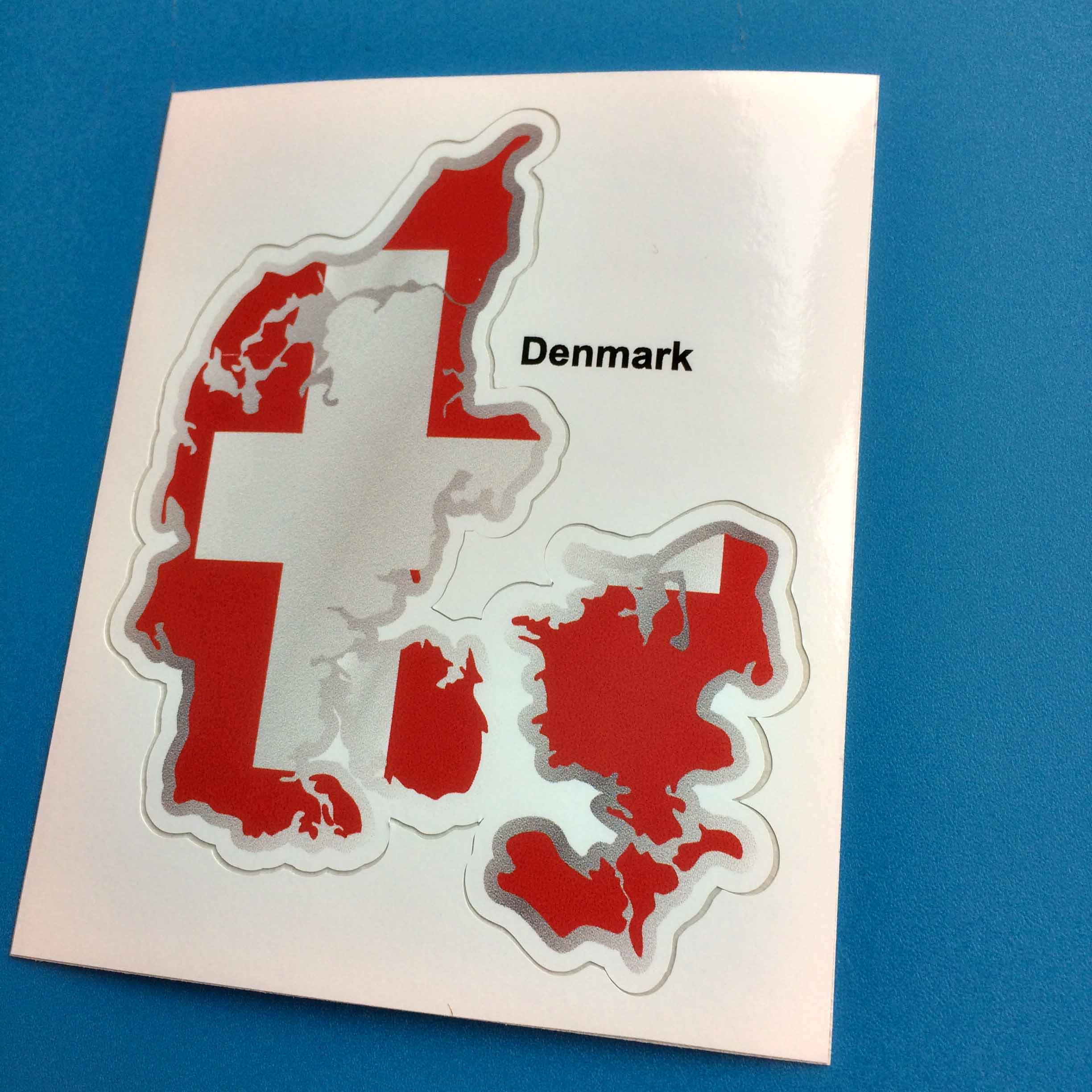 A flag and map of Denmark. A white cross on a red background.