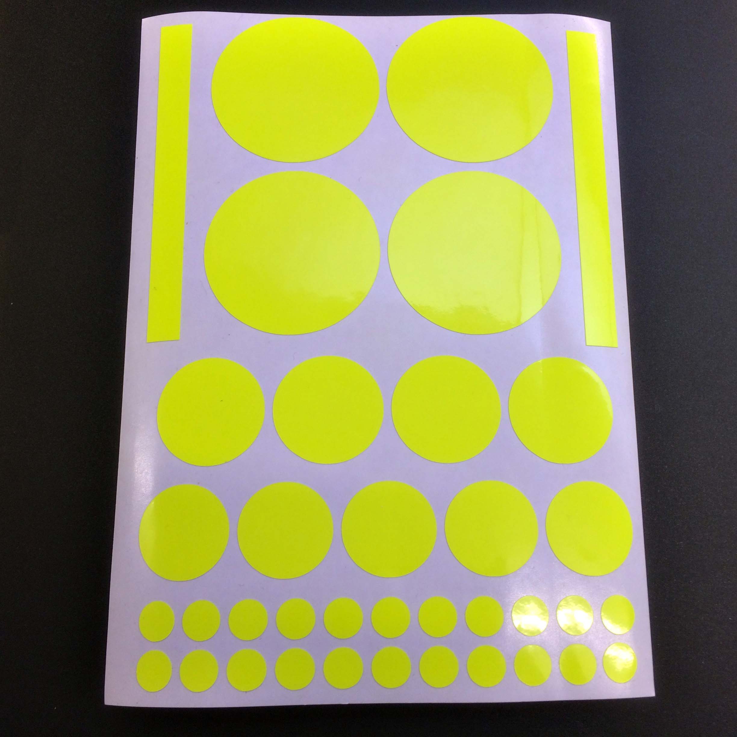 Fluorescent yellow dots and stripes.