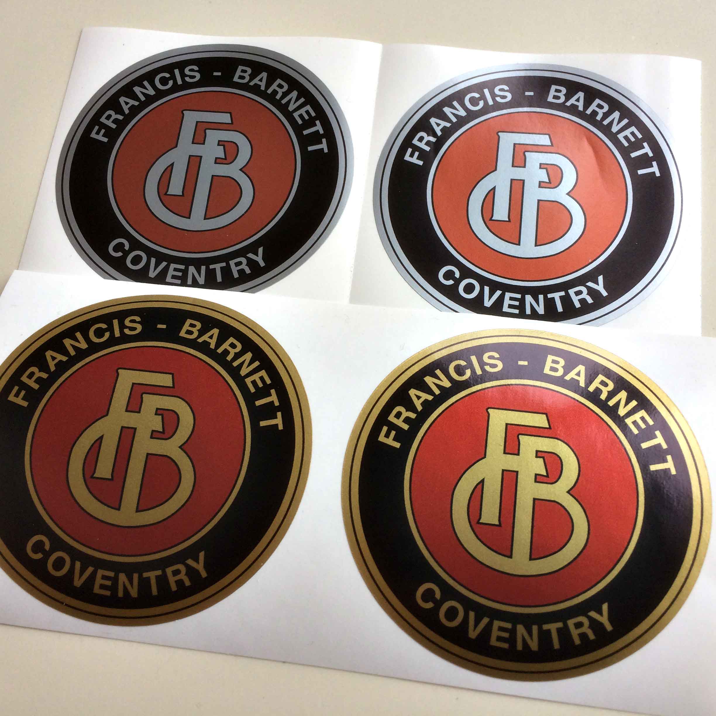 FRANCIS BARNETT VINTAGE STICKERS. Francis - Barnett Coventry in gold or silver lettering surrounds a black circle with a gold or silver border. In the centre on a red circle are the initials FBC in gold or silver.
