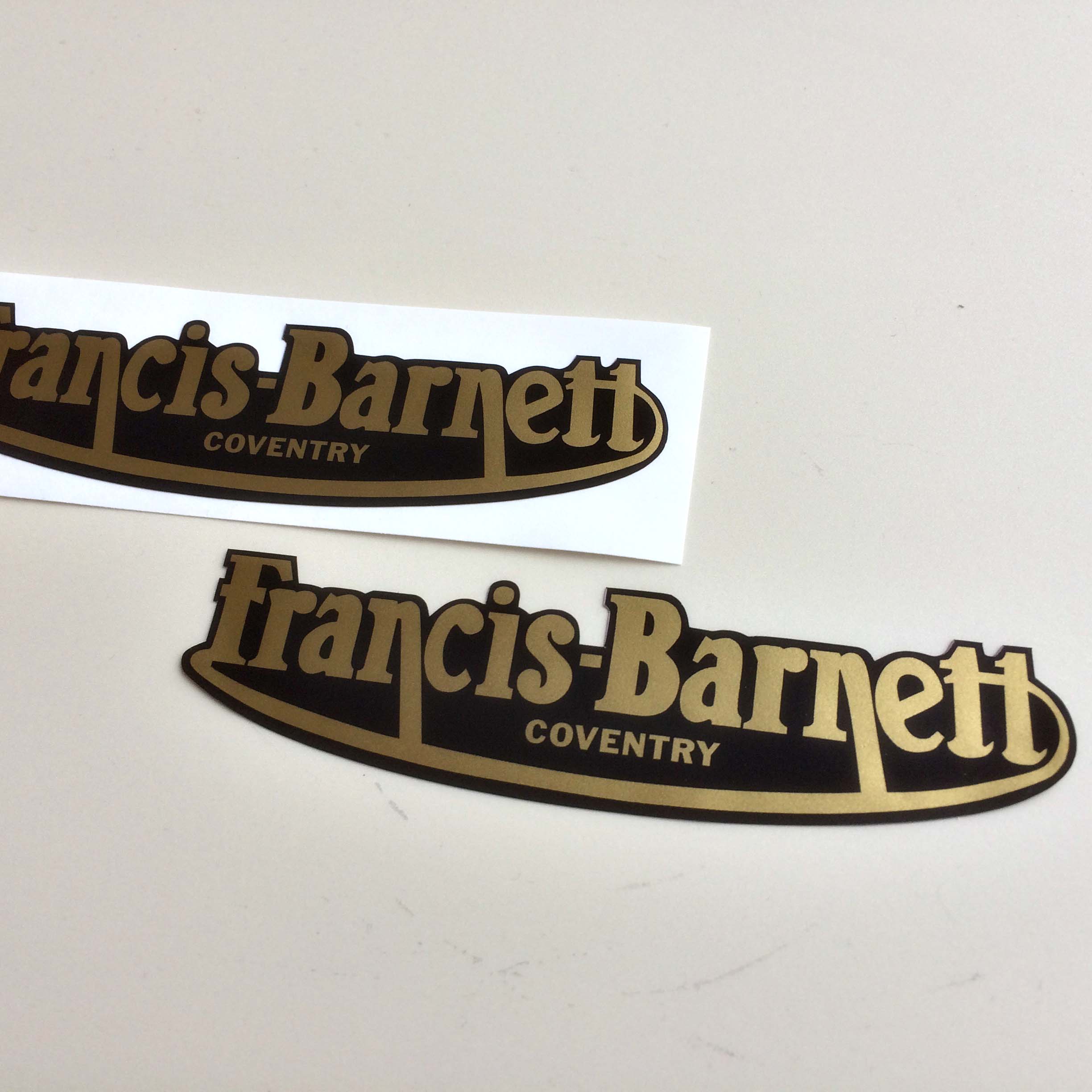 FRANCIS BARNETT LETTERING VINTAGE STICKERS. Francis-Barnett in lowercase lettering with Coventry in uppercase lettering below on a black background.
