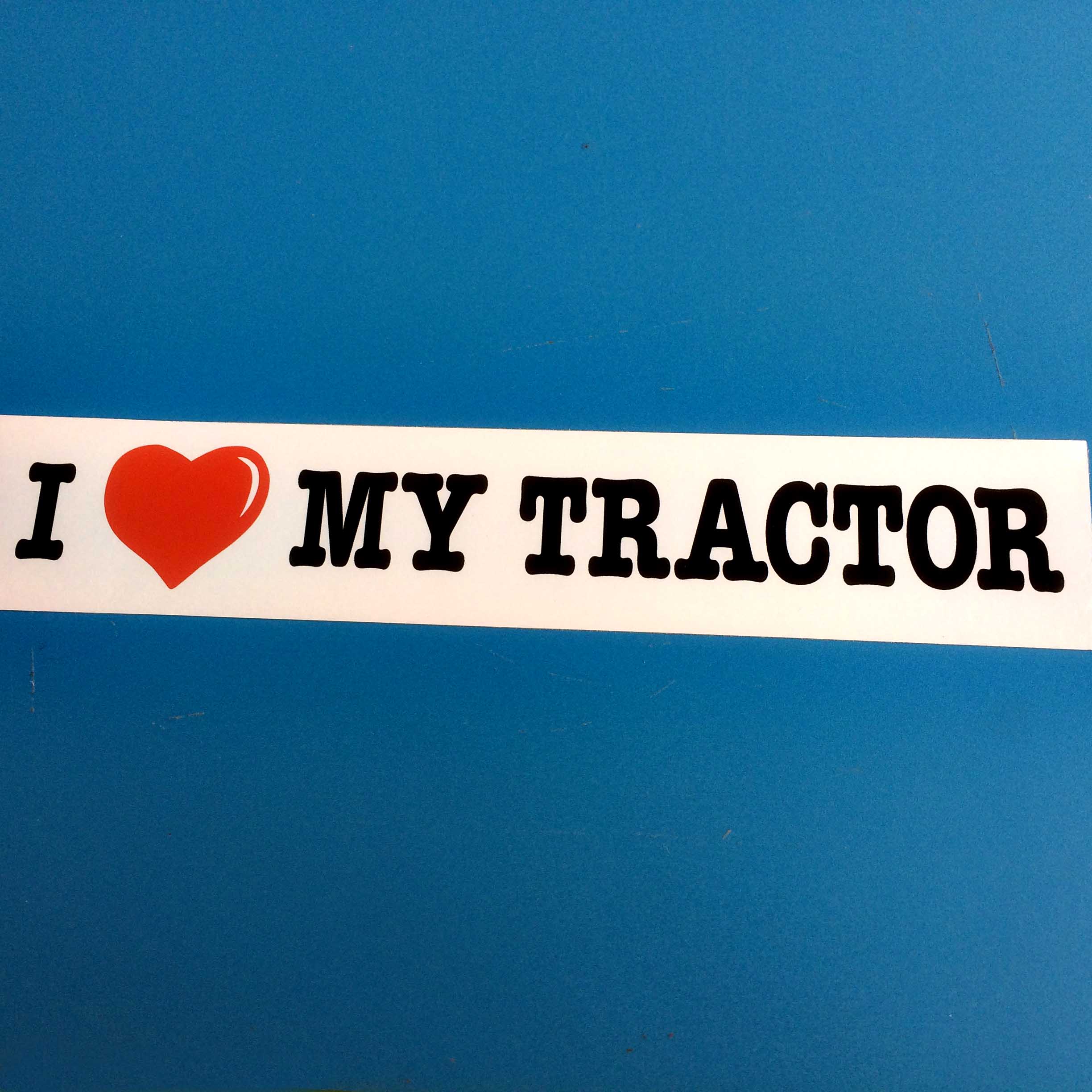A red love heart sits between I and My Tractor in bold black lettering on a white background.