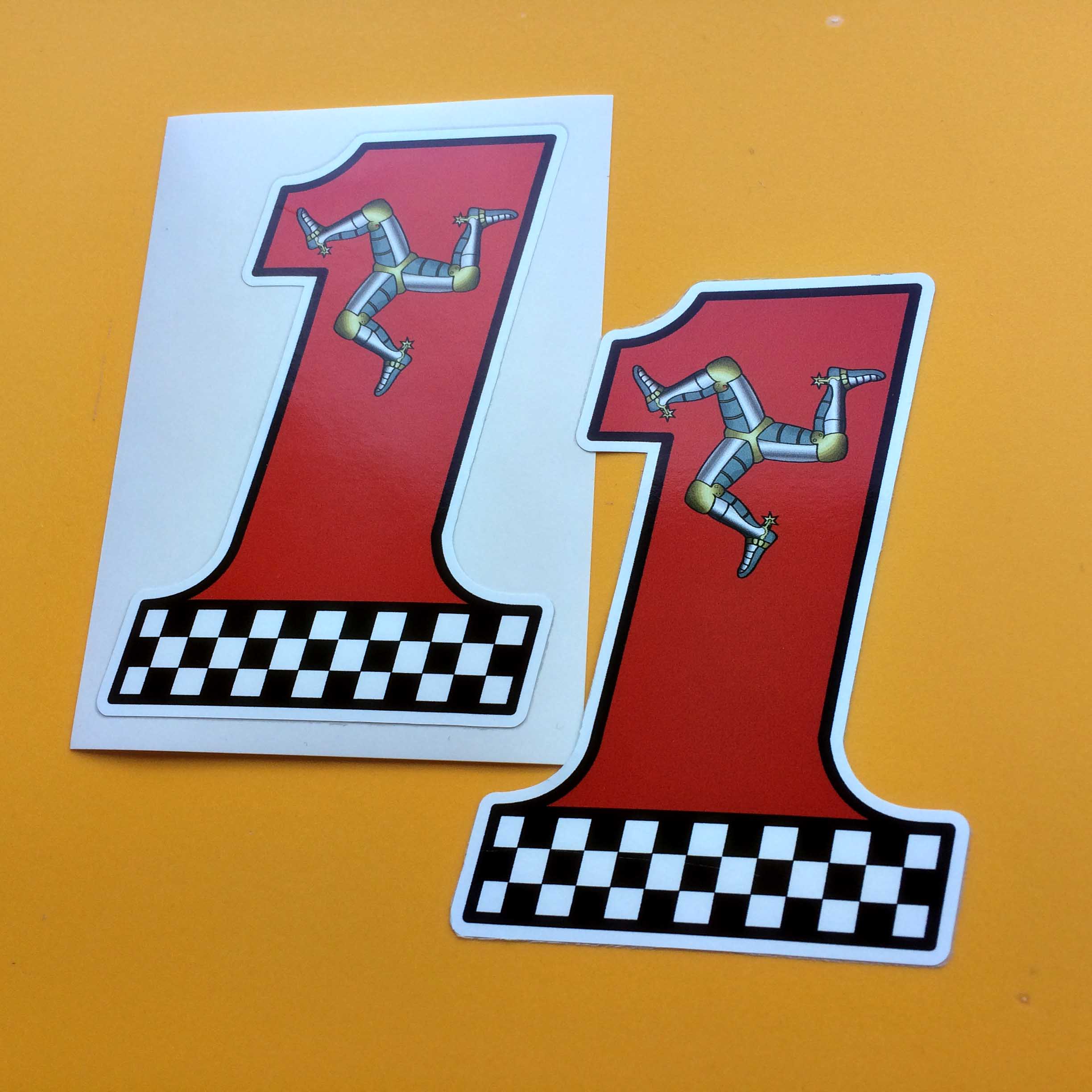 ISLE OF MAN CHEQUERED NO 1 STICKERS. A number 1 in red with a black and white chequered base. At the top is a triskelion; three armoured legs with golden spurs.
