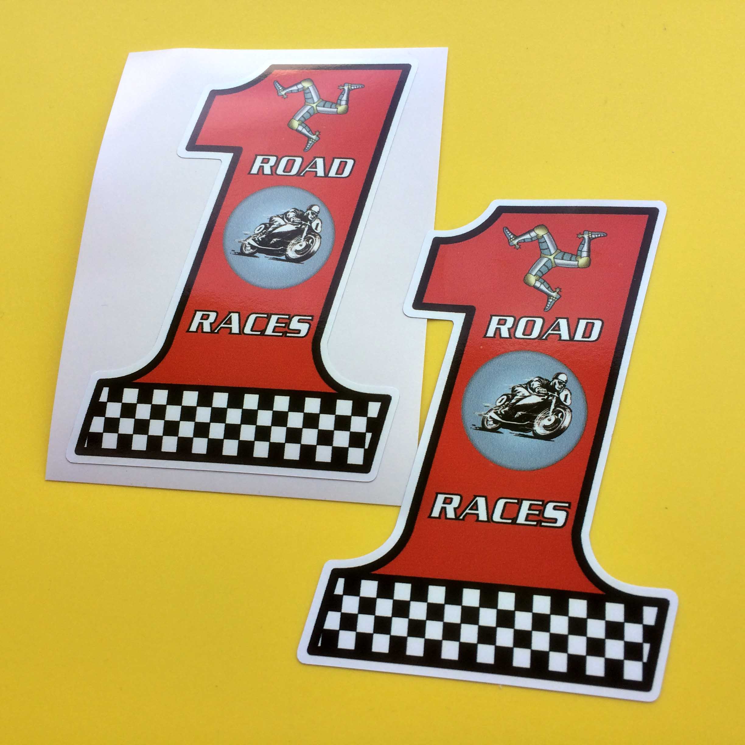 ISLE OF MAN NO 1 ROAD RACE STICKER. A number 1 in red. A man on a motorbike sits between Road Races in white lettering. At the top and base of the number are a triskelion and a chequered flag.