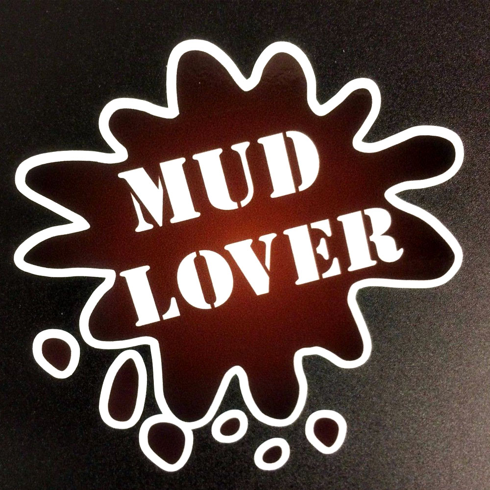 MUD LOVER OFF ROAD STICKER. Mud Lover in white capital letters in the centre of a splattering of brown mud.
