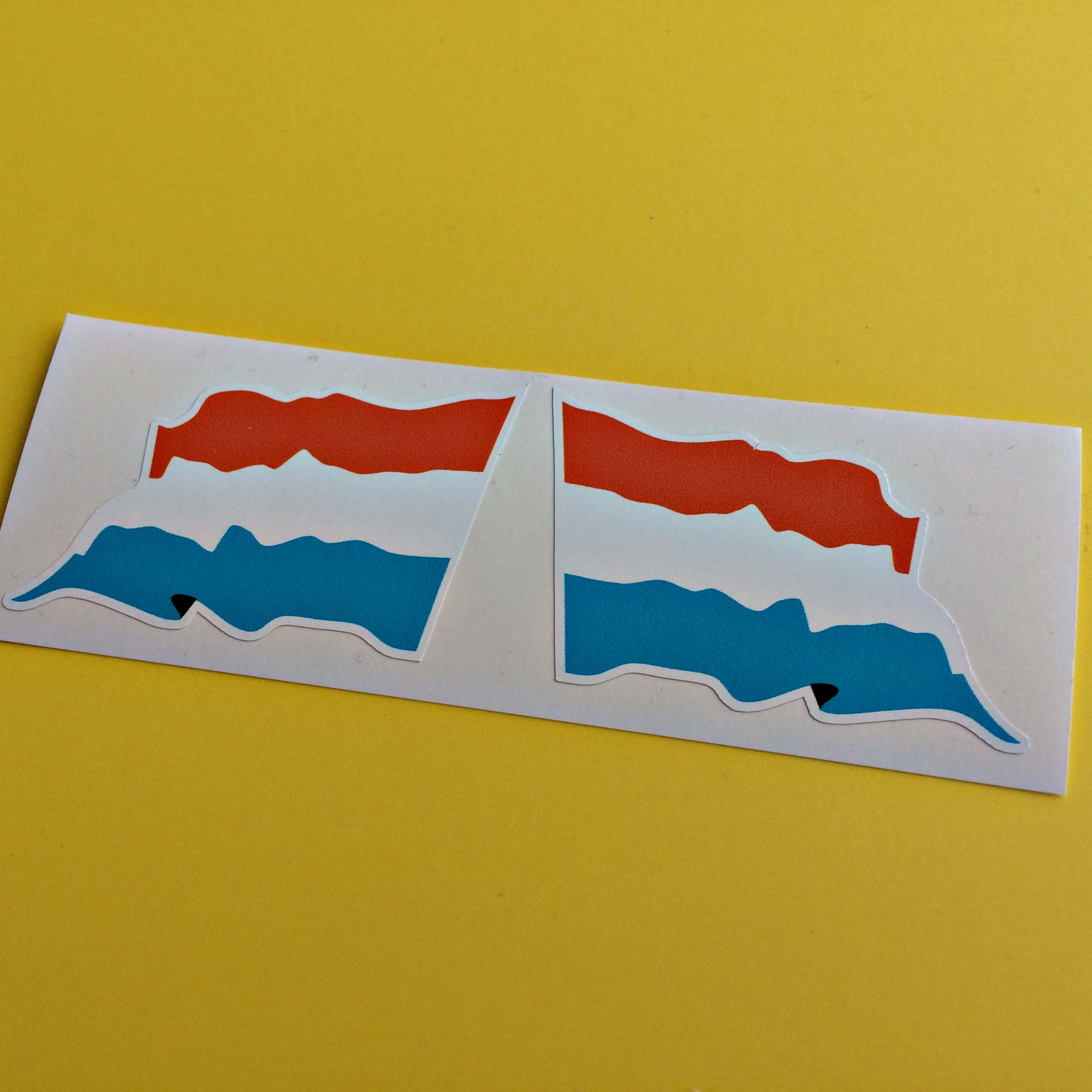 NETHERLANDS WAVEY FLAG STICKER. The flag is a horizontal tricolour of red, white and blue.