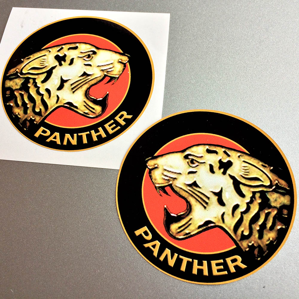 PANTHER (HANDED) STICKERS. Side view of a gold head of a panther with black stripes. Panther in gold lettering below on a background of two concentric circles in black and red.