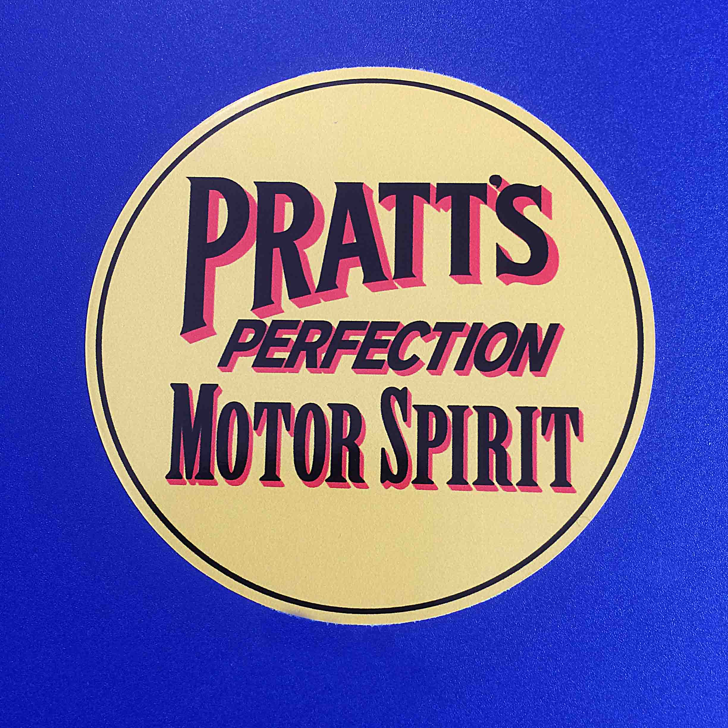 PRATTS PERFECTION MOTOR SPIRIT STICKER. Pratt's Perfection Motor Spirit. Black/red shadow lettering on a pale yellow background.