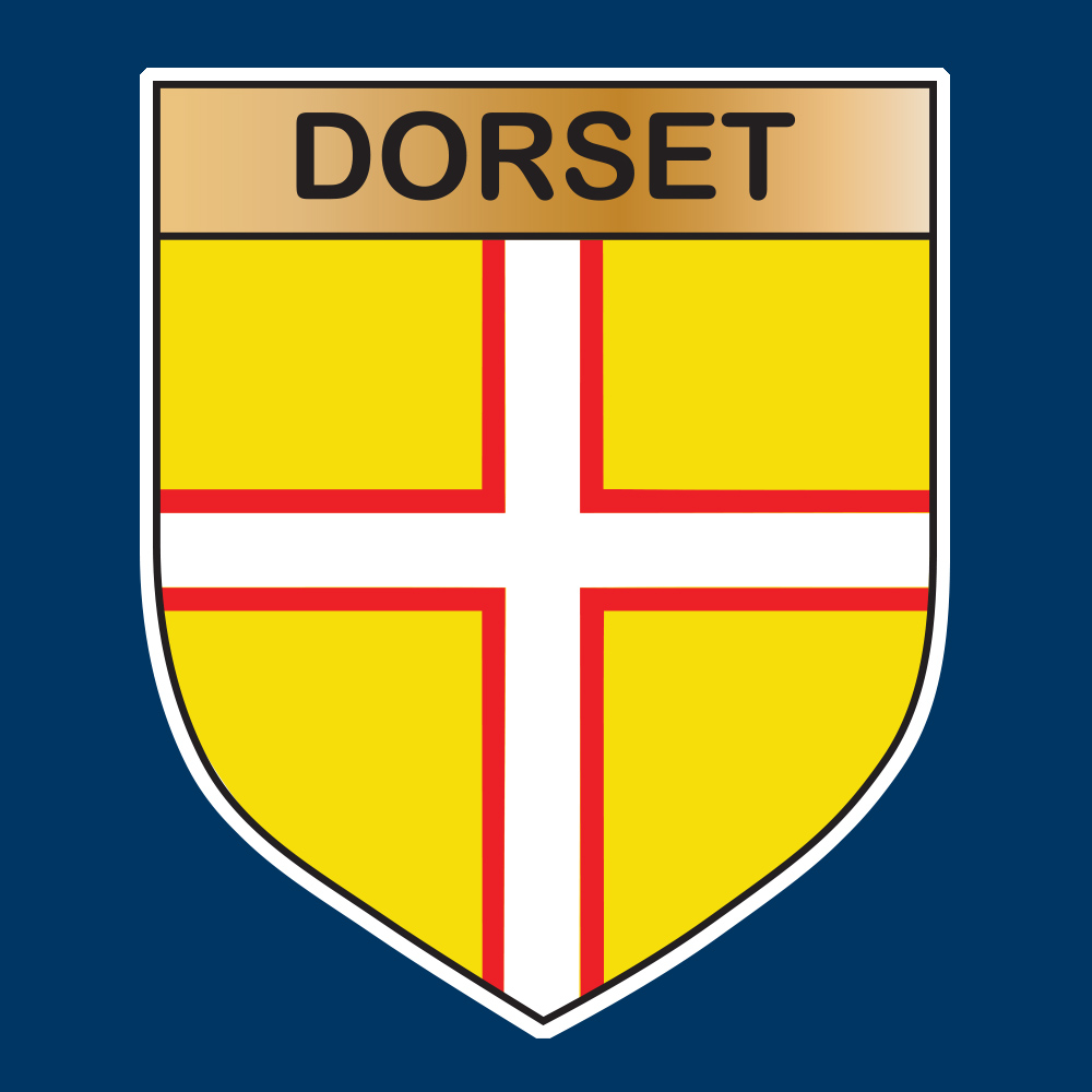 DORSET COUNTY SHIELD STICKER. Dorset in black lettering on a gold banner across the top. A white cross with a red edge on a yellow shield.