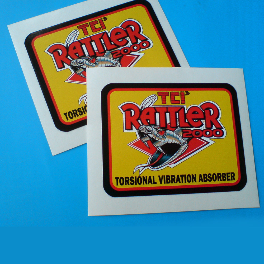 TCI RATTLER STICKERS. TCI Rattler 2000 in bold red lettering; Torsional Vibration Absorber in black on a yellow background with a red and black border. Centre is a rattlesnake, jaws open, displaying fangs and a forked tongue.
