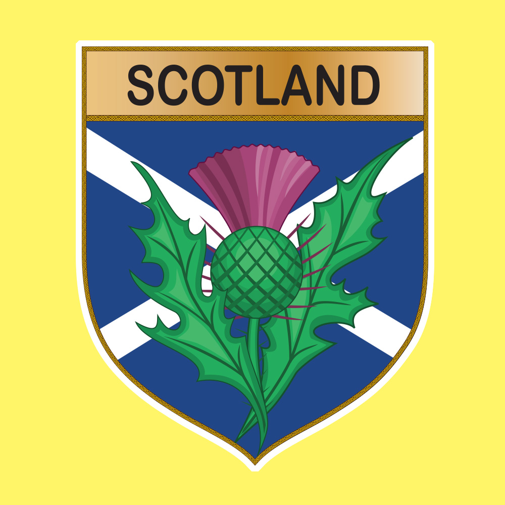 SCOTLAND EMBLEM SHIELD STICKER. Scotland in black lettering on a gold band at the top of the shield. Below is a thistle overlaying the Scotland flag.
