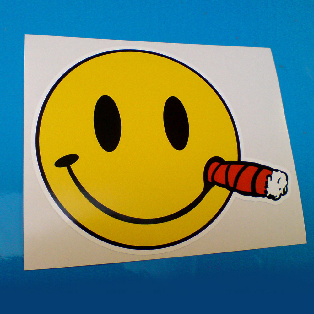 SMILEY EMOJI WITH CIGAR STICKER. A yellow smiley face with black eyes and a cigar in one side of the mouth.