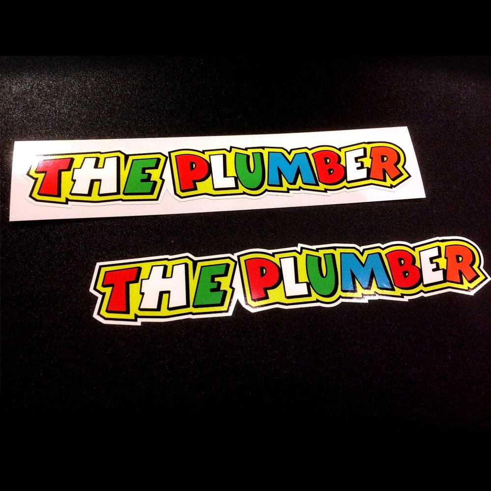 The Plumber in bold colourful lettering. Red, white, green, blue and orange letters on a yellow background.
