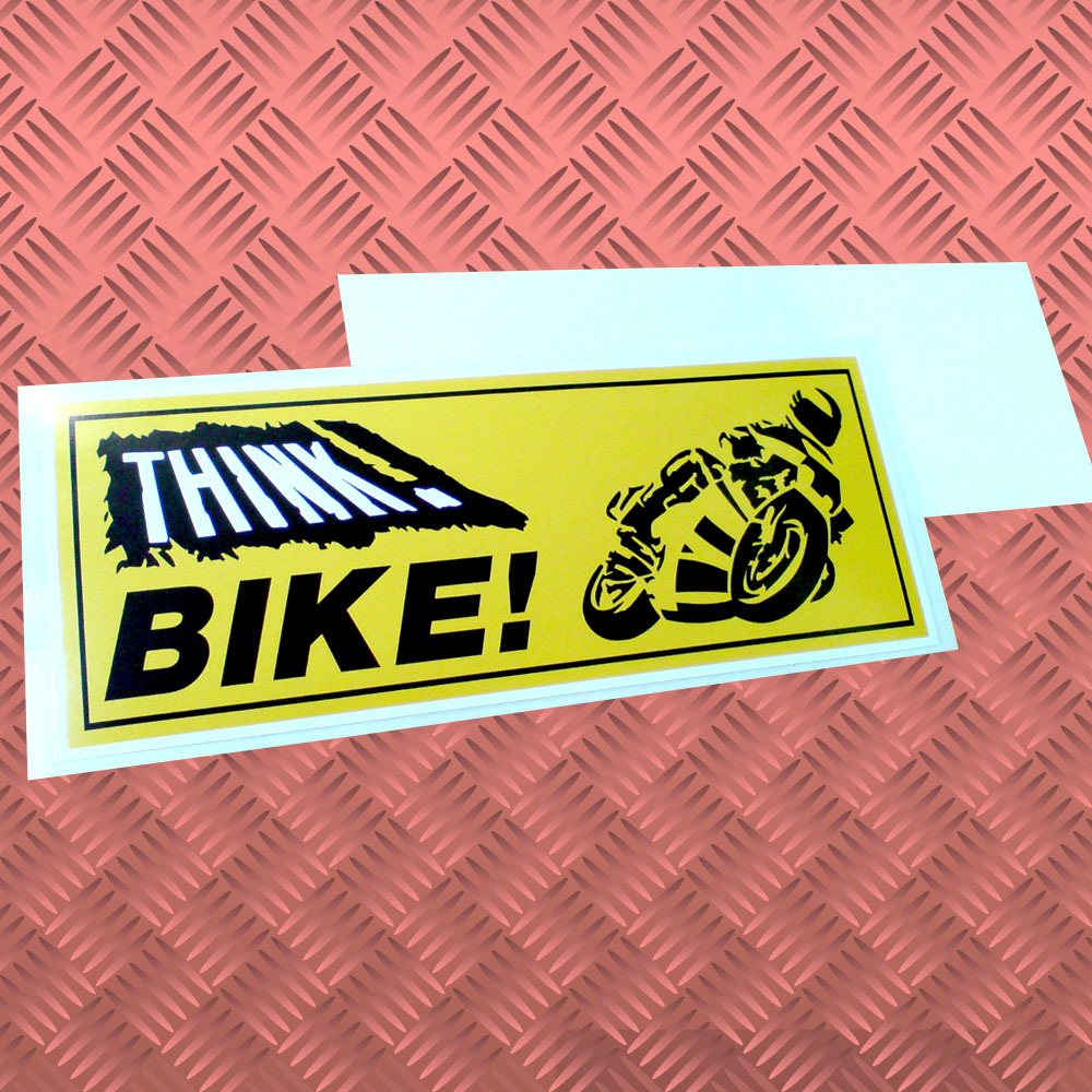 Think Bike! in black and white bold lettering on a yellow background next to a motorcyclist riding his bike.