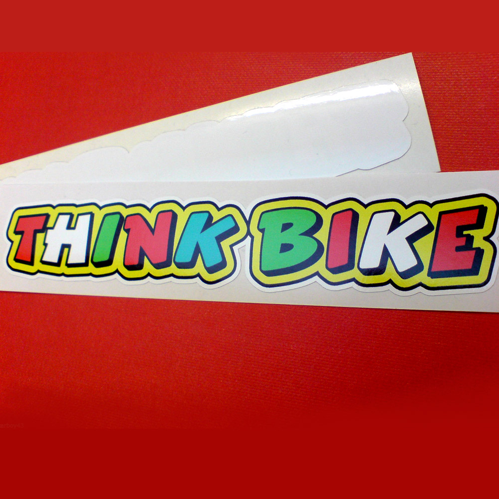 THINK BIKE WINDOW STICKER Think Bike in bold colourful lettering. Red, white, green and blue letters on a yellow background.