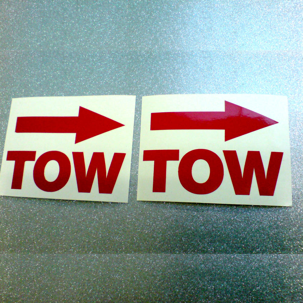 TOW AND ARROW STICKERS Tow in bold red uppercase lettering with a red arrow above.