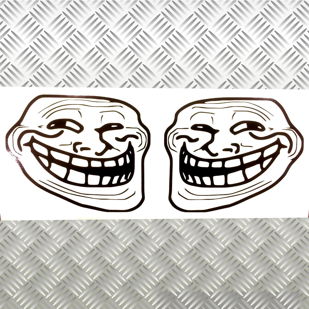 A rage comic face wearing a mischievous smile in black and white.