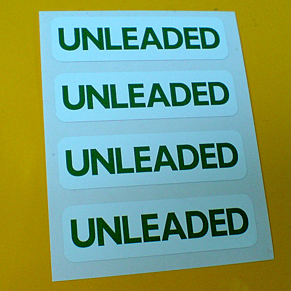 UNLEADED FUEL REMINDER STICKERS. Unleaded in bold green uppercase lettering on a white background.