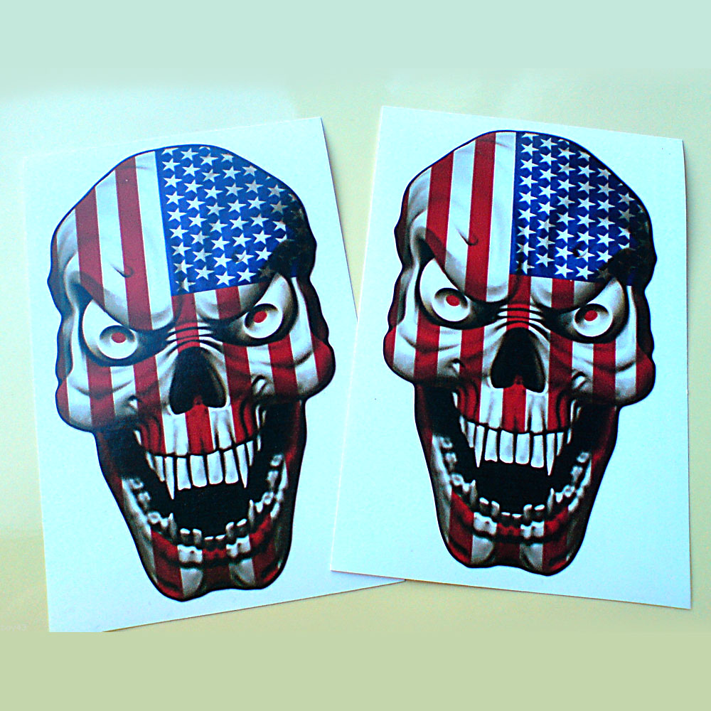 An American Stars and Stripes flag skull with red eyes and white teeth.