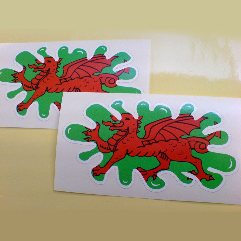 WALES/WELSH FLAG SPLAT STICKERS. A red dragon on a green background in the shape of a splatter of paint.