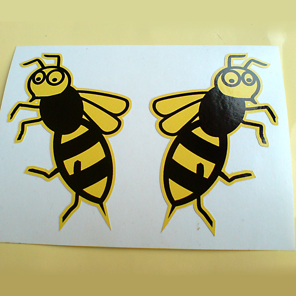 WASP SCOOTER STICKERS. A black and yellow humorous wasp displaying wings, legs and antennae.