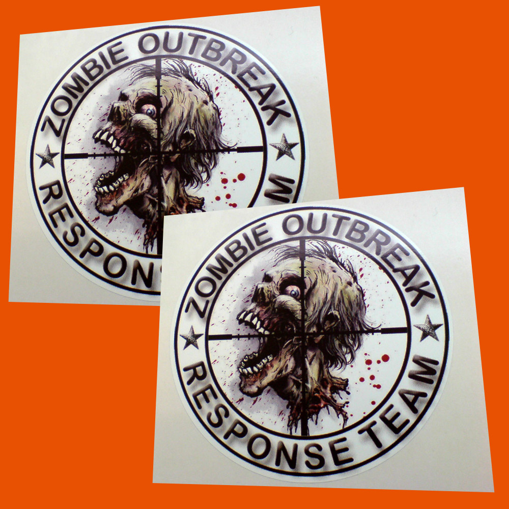 Zombie Outbreak Response Team and two stars in black surround this white circular sticker. In the centre is a zombie with bloodshot eyes, wispy facial hair and mouth wide open displaying teeth and blood spatter all around.