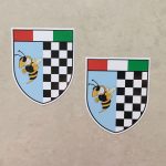 ITALIAN CHEQUERED SHIELD VESPA STYLE STICKERS. A shield in three sections; Italian tricolour across the top, below black and white chequer and a wasp.