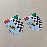 ITALIAN CHEQUERED SHIELD VESPA STYLE STICKERS. A shield in three sections; Italian tricolour across the top, below black and white chequer and a wasp.