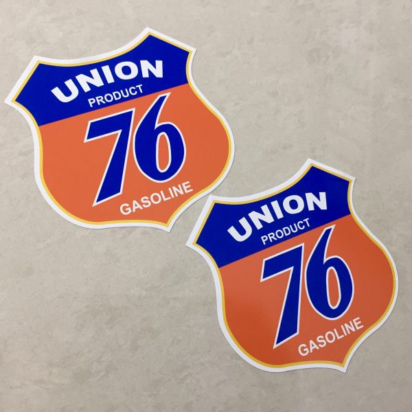 UNION 76 GASOLINE STICKERS. Union Product 76 Gasoline lettering on a blue and orange Route 66 shaped sticker.