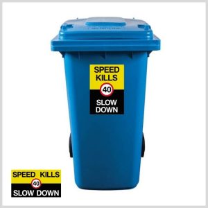 SPEED KILLS 40MPH. Blue wheelie bin with black and yellow sticker showing a 30mph sticker