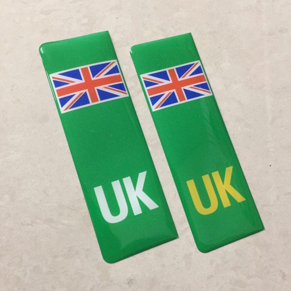 NUMBER PLATE ORIGIN EV STICKERS DOMED RESIN GEL UK. Two green columns. UK in white at the base of one column. UK in yellow on the other. Both stickers have the Union Jack at the top.