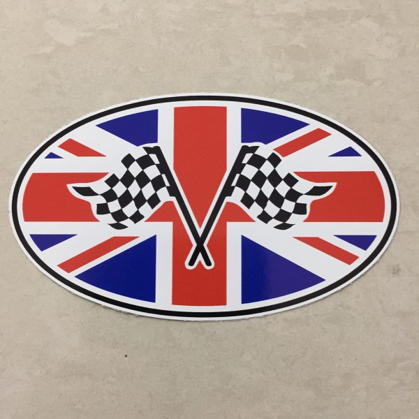 UNION JACK CHEQUERED STICKER. Two crossed black and white chequered flags overlay an oval Union Jack.