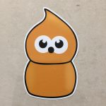 ZINGY FLAME MASCOT STICKER. A humorous sticker. An orange flame with black eyes and a black nose.