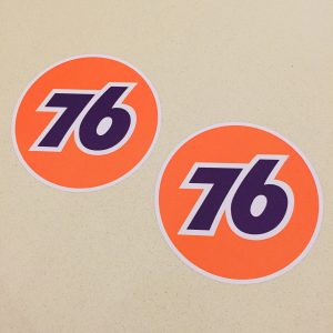 76 UNION CAR STICKERS The number 76 in blue in the centre of an orange circular sticker.