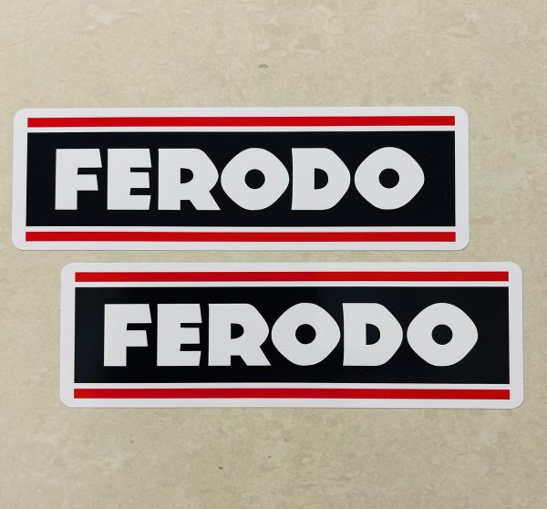 FERODO STICKERS. Ferodo in white uppercase lettering on a black background with a red and white border.