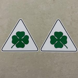 ALFA ROMEO CLOVERLEAF STICKERS. A white triangular sticker with a black border. In the centre is a green four leaf clover