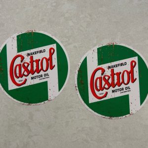 CASTROL WAKEFIELD RUSTY STICKERS. The classic Castrol logo with a rusty effect. A green circular sticker with Castrol in red lettering on a white background in the centre. Additional text in black, Wakefield Motor Oil (Patented).